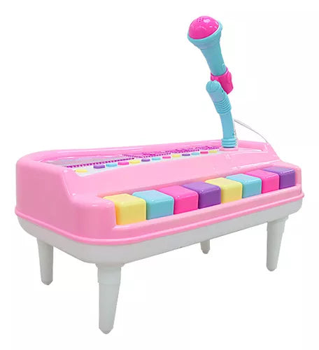 Piano de juguete con micrófono