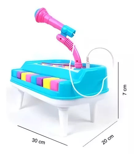 Piano de juguete con micrófono